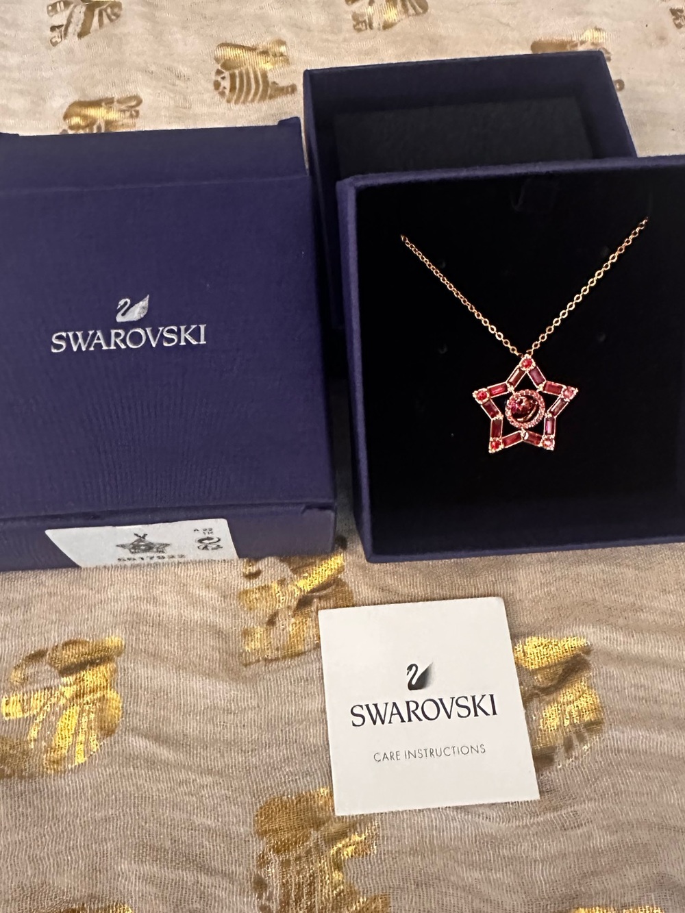 Swarovski Rose Gold Star Necklace with Red-Pink Crystals
